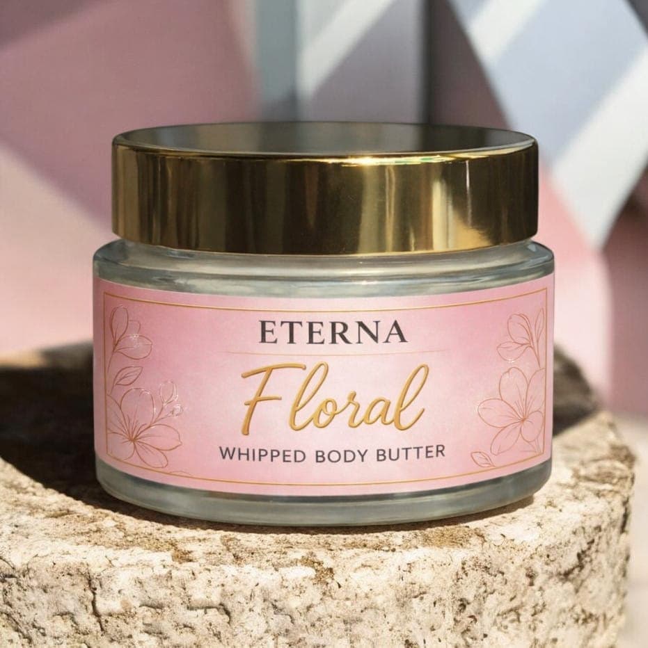 Floral whipped body butter with a gold lid