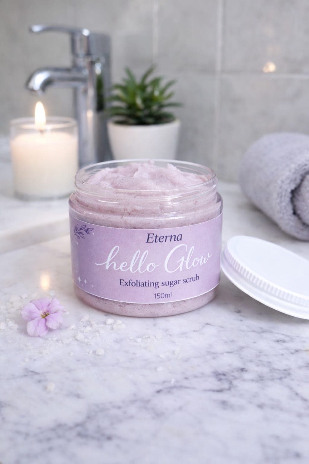 Hello Glow exfoliating sugar scrub on marble